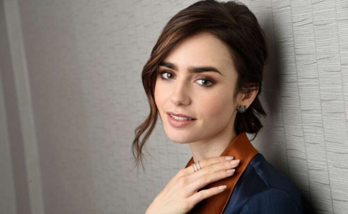 Le roban a Lily Collins sus anillos de boda